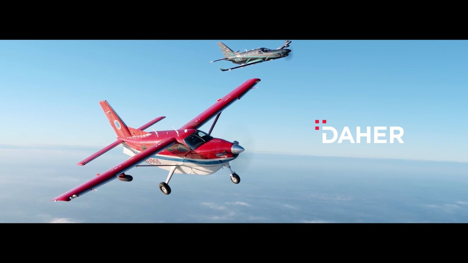 Still from the Daher brand film: a Daher aircraft in flight