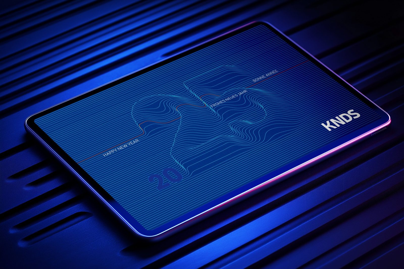 KNDS digital greeting card displayed on a tablet, with new-year wishes in English, German and French